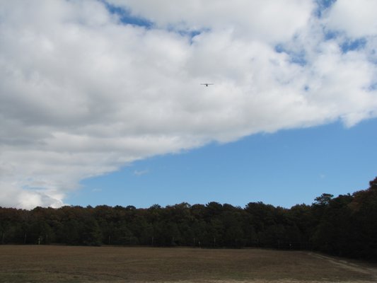 East Hampton Town has been criticized for plans to clear as much as 20 acres of woodlands to meet FAA safety standards for low-visibility landings at East Hampton Airport. Michael Wright