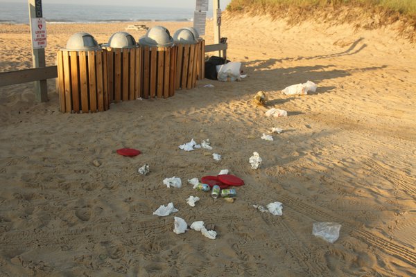 Bits of trash left along the top of Atlantic Avenue beach last weekend. DELL CULLUM