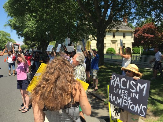 Black Lives Matter rally members standing outside of Village Hall in East Hampton JON WINKLER