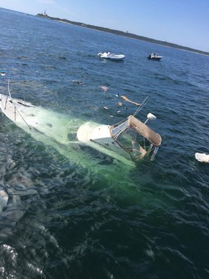 Seven people were rescued from a sinking vessel off Montauk Point on Sunday morning by a Good Samaritan and the US Coast Guard.  COURTESY US COAST GUARD
