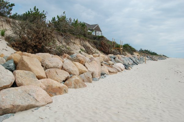 Sand makes a poor foundation for these huge rocks armoring the lighthouse. MIKE BOTTINI