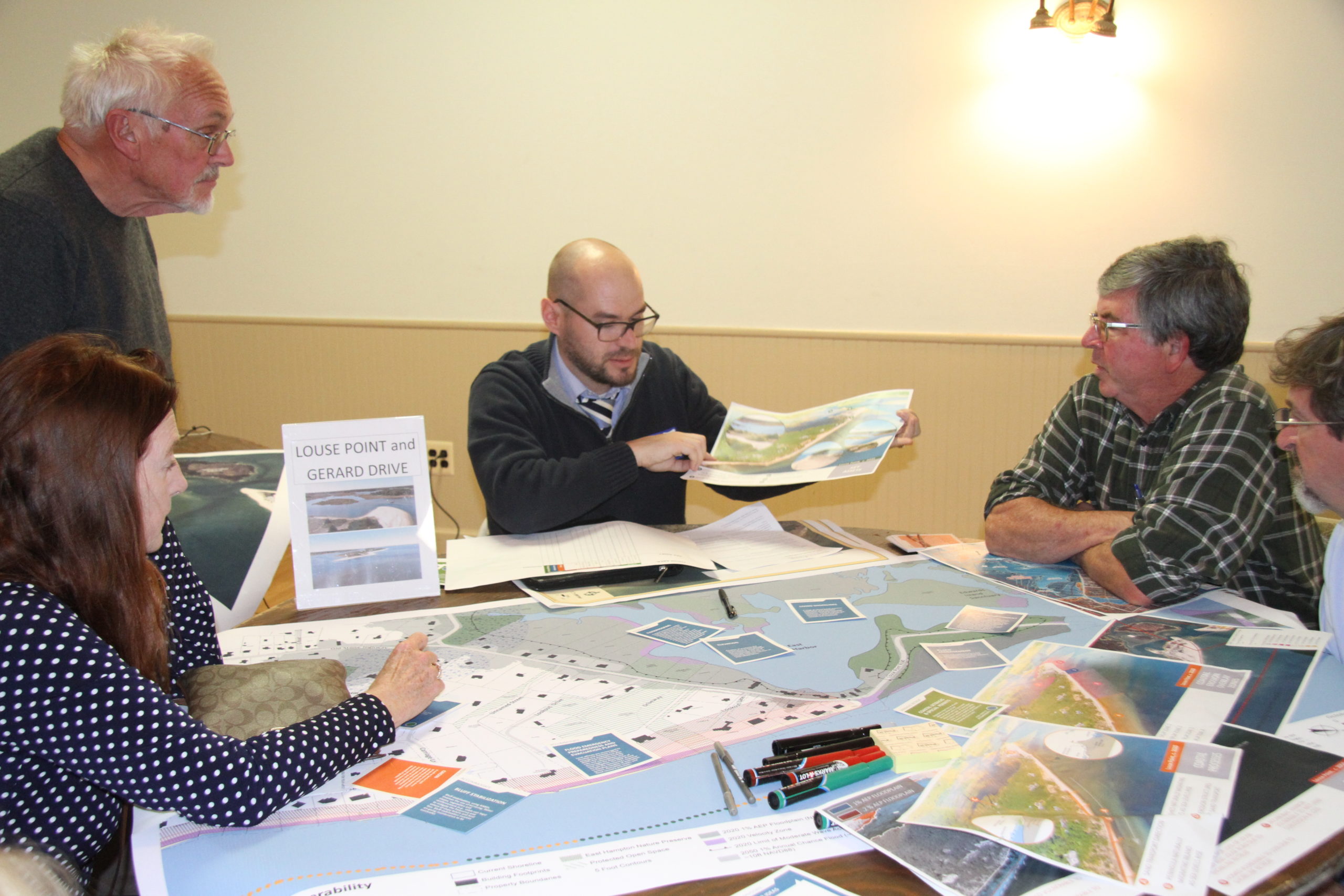 Consultants and residents pored over areas of the town that already face chronic flooding and erosion problems at a work shop in October at the Amagansett American Legion. 
