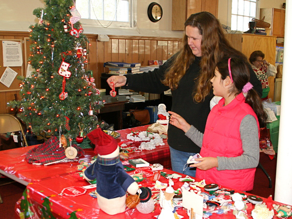 Debbie Niggles and Carolina Ortega at the Amagansett Presbyterian Church's Christmas Craft Sale at Scoville Hall on Saturday.