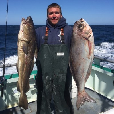 Tyler Quaresimo with nice specimens of a cod and barrelfish caught aboard the Viking Starship on a  deepwater wreck trips off Montauk late last month. Courtesy of the Viking Fleet