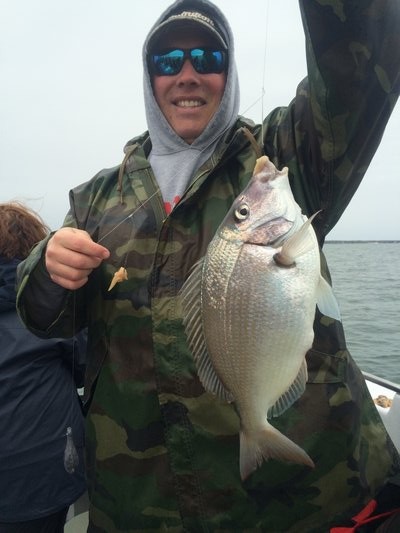 Jessie Fritz from Westhampton was aboard the Shinnecock Star for the opening day of porgy season and got in on the good fishing in the Peconics. Deena Lippman/Shinnecock Star