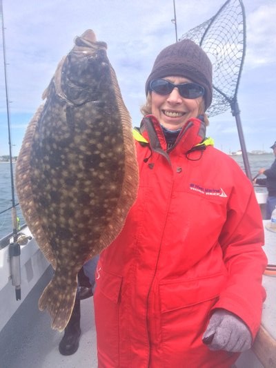 Judy Rose of Hampton Bays got a couple of great birthday presents: a day of fishing on the Shinnecock Star and a limit of nice fluke. Deena Lippman/Shinnecock Star