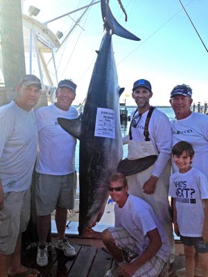 The crew of John Haley's boat Reel Lucky took top honors in the Wally Oakland Memorial Shark Tournament at Oaklands Marina last Tuesday with this 355 pound mako.