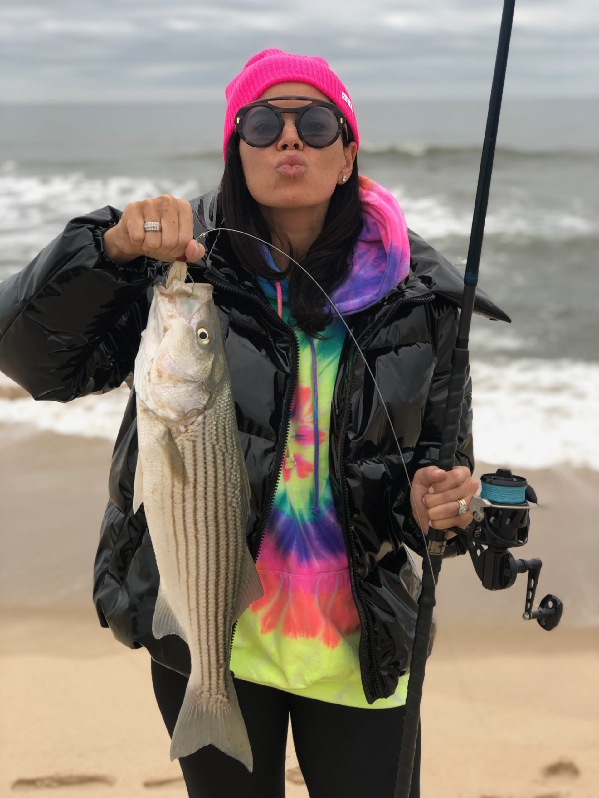 Surf anglers like Jessica Lobosco got a chance to kiss the striped bass goodbye before this week's noreaster, which could spell the end of striper fishing for 2019 on the South Fork. 
