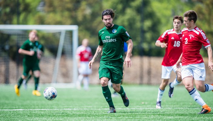  third from right) recently signed a contract with the New York Cosmos 'B' team