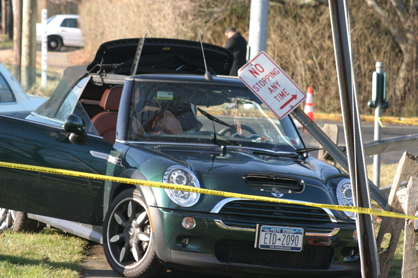 The Mini Cooper convertible collided with a truck carrying natural gas.
