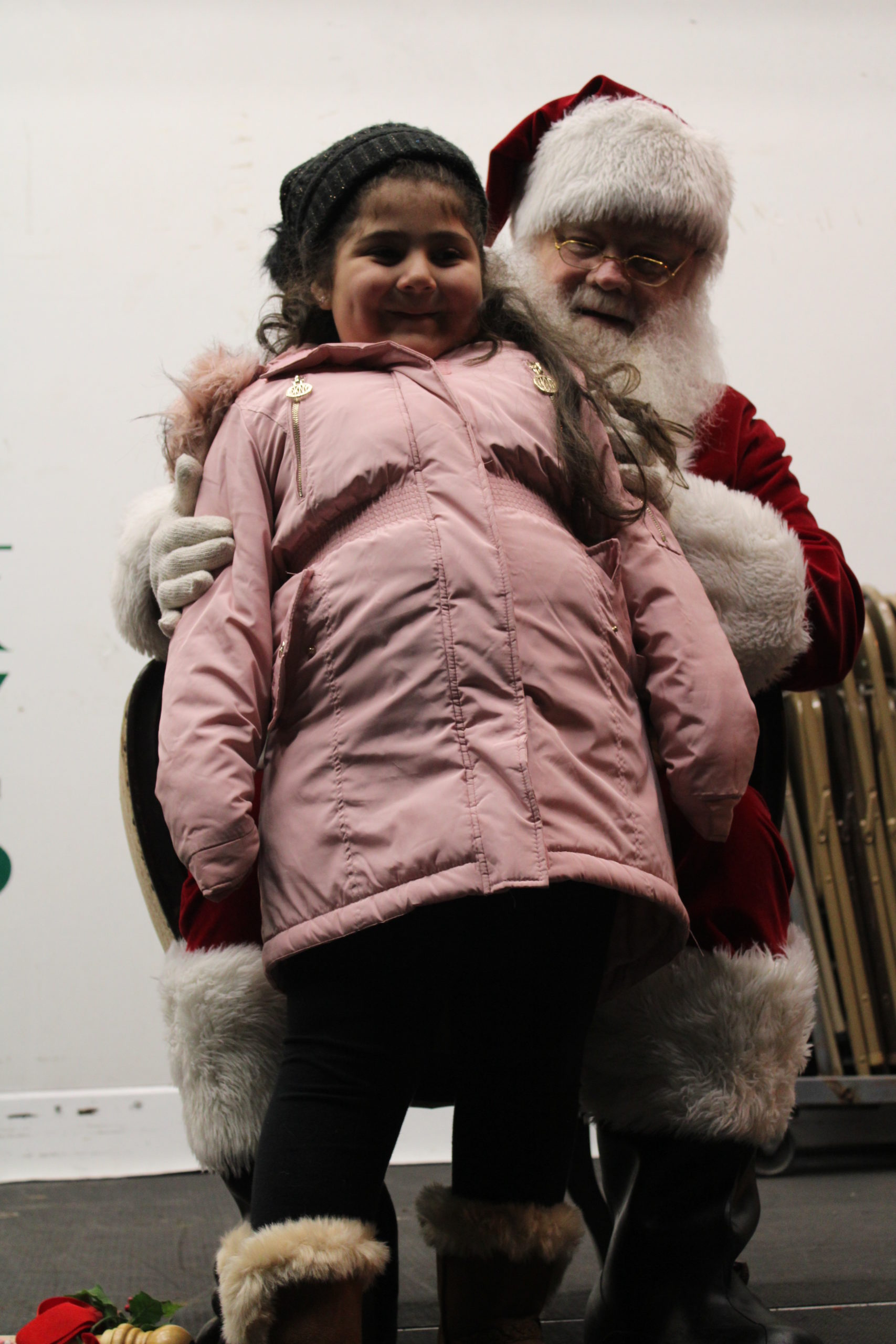 Daralyn Perez meeting Santa.  