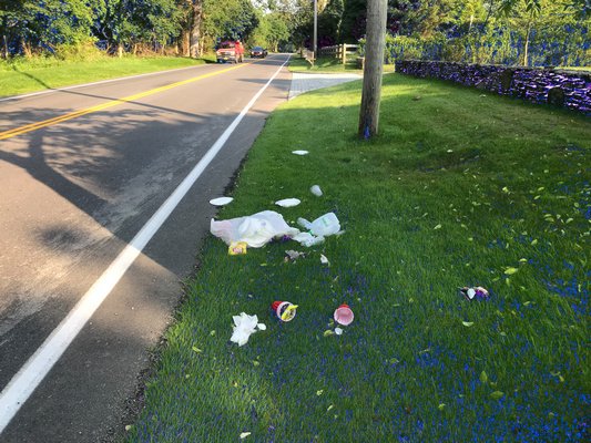 Trash left on the side of Cedar Street in East Hampton this week. COURTESY DELL CULLUM