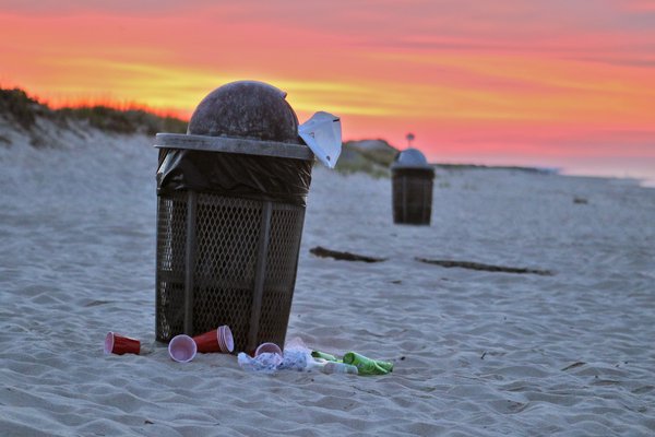 An overflowing trash can at a local beach. COURTESY DELL CULLUM