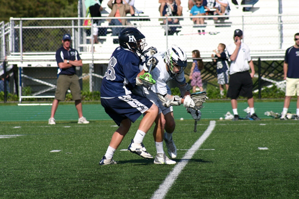  and Ryan Curley fight for a ground ball against Huntington. KERRY MONACO