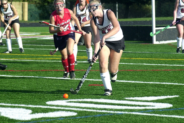 Briana Frasher looks up the field for someone to pass the ball to during her team's loss to Miller Place.<br>Photo by Cailin Riley