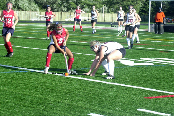Briana Frasher lays down a block tackle.<br>Photo by Cailin Riley
