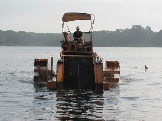 The aquatic weed harvester that has been working to remove algae from Georgica Pond this summer. Michael Wright