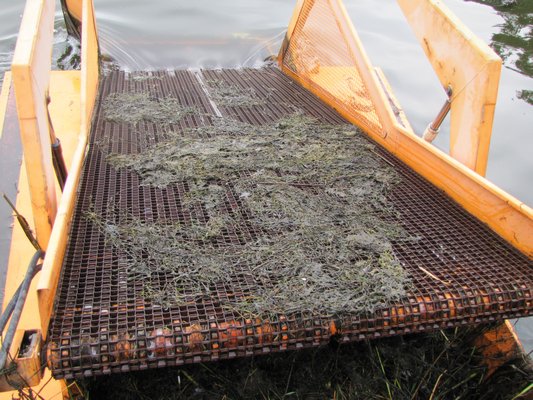 The aquatic weed harvester that has been working to remove algae from Georgica Pond this summer. Michael Wright