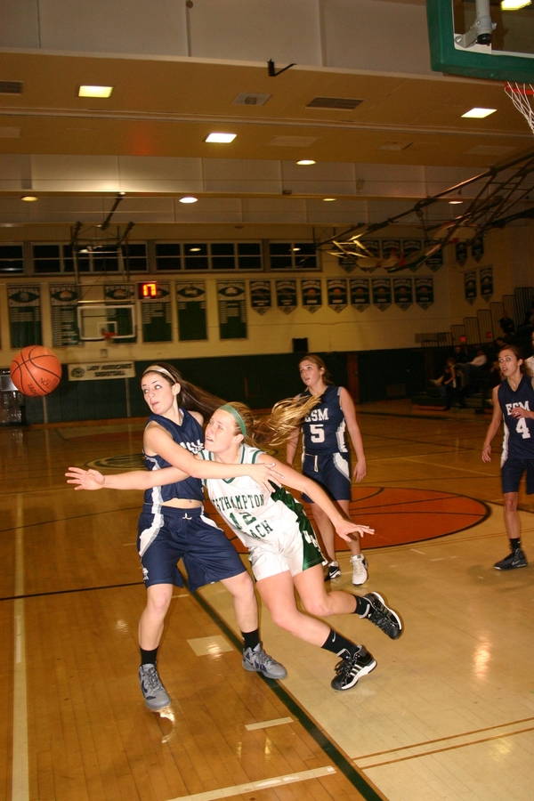 Lady Hurricane Lauren Smith and ESM's Alison Gionta fight for a loose ball. 