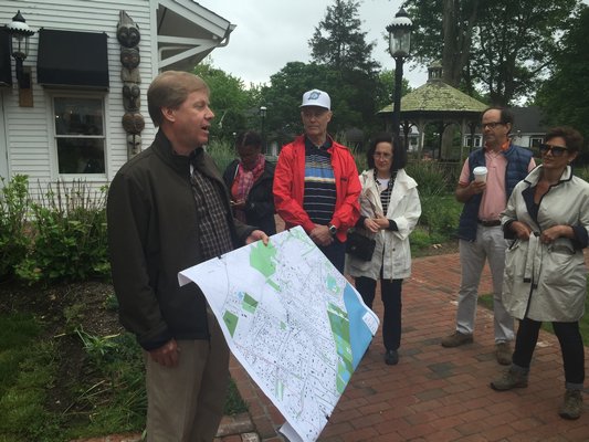 Consultant Peter Flinker led a walking tour of Amagansett's business district on Friday morning. MRW