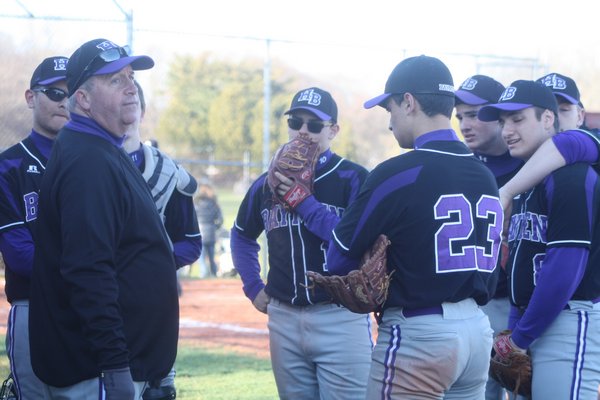 Hampton Bays head coach Pete Meehan talks to his team in the first game of their series with East Hampton. CAILIN RILEY