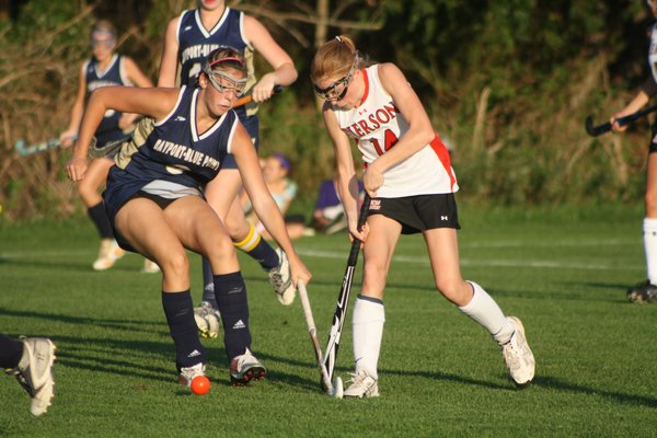 Ana Sherwood tries to bring the ball into the circle for Pierson. CAILIN RILEY