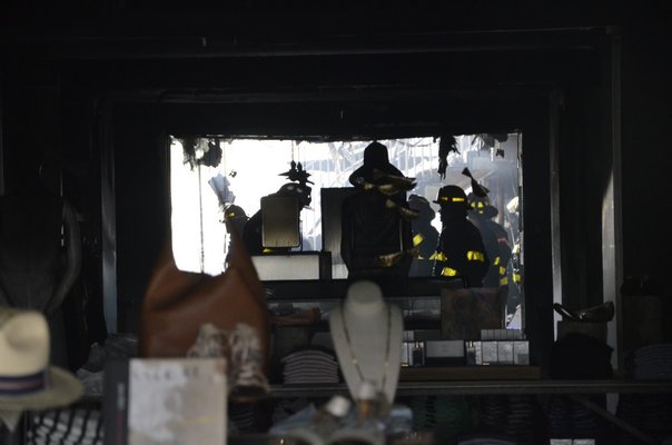 A fire that started in mechanical units at the back of Rowdy Hall restaurant in East Hampton spread to an adjacent building