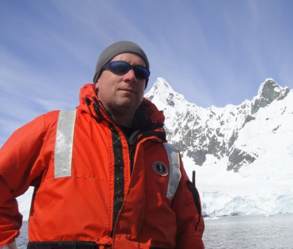 A whale surfaces in Antartica.