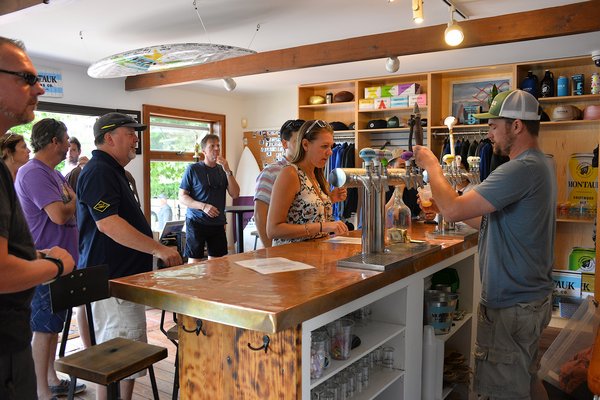 Customers waiting for a glass of beer at the Montauk Brewing Company. KYRIL BROMLEY