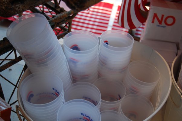 Cups embroidered with Mr. Trump and Mrs. Clinton's names sold at the Monogram Shop on display. JON WINKLER