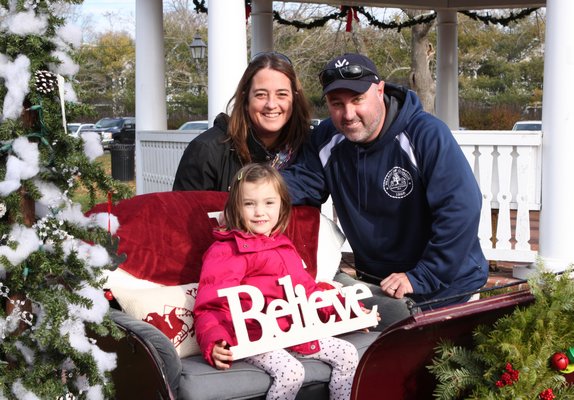 Abigail Grieco checking on the manger at the Dickens Family Holiday Festival in Westhampton Beach on Saturday