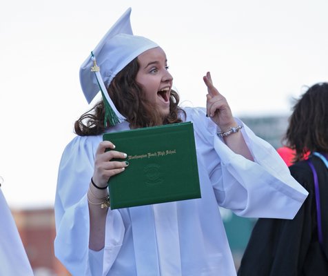 A couple creative mortar boards at the Westhampton Beach High School class of 2015 graduation ceremony on Friday