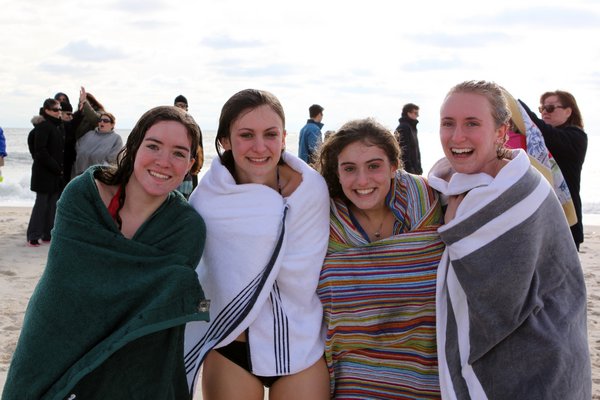  Sarah Beaver and Grace Bilbakian at the Westhampton Beach High School Student Government's Polar Bear Plunge on Saturday morning at Rogers Beach. NEIL SALVAGGIO