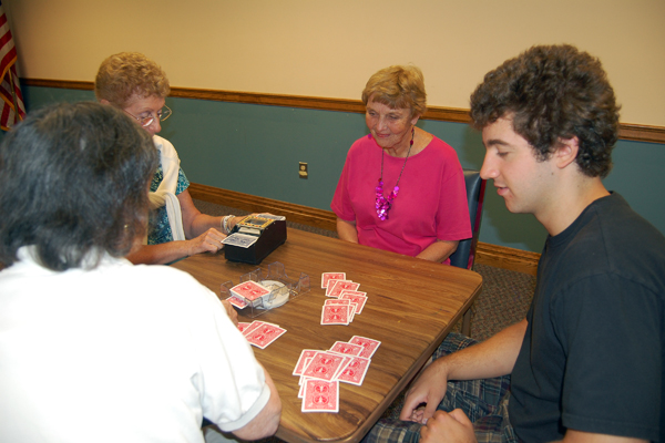Paul Norris plays a round of Canasta at the Hampton bays Public Library. 