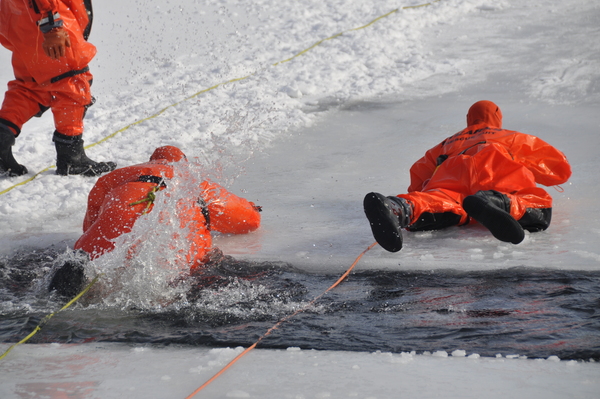 Eastport Fire Department Captain Mark Yakaboski prepares a course on the West Pond for an ice drill on January 22. 