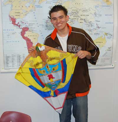 Southampton High School  student Jhonathan Florez with the kite he designed for Kites for a Cure.