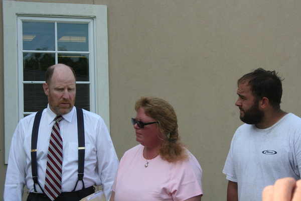 The Reverend Steven Howarth led a prayer vigil outside East Hampton Town Justice Court on Thursday before Kelly and Paul Lester appeared to face DEC charges. KYRIL BROMLEY
