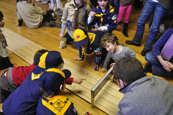  keeps track of the heats during the Pinewood Derby on January 24 at American Legion Post 338 on Bay Street. MICHELLE TRAURING