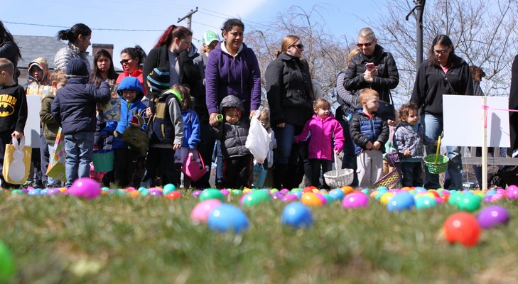  wait patiently for the start of the Greater Westhampton Chamber of Commerce's annual Easter Egg Hunt on Saturday. NEIL SALVAGGIO