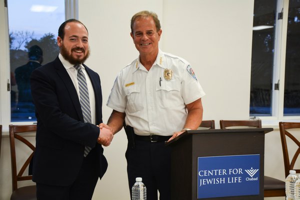 Rabbi Berel Lerman AND  Southampton Town Police Chief Steven Skrynecki at the opioid forum at the Center for Jewish Life - Chabad in Sag Harbor.   DOROTHY MAI