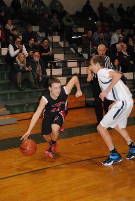 The Whalers' Andrew James finds room on the baseline to drive to the rim. BRETT MAUSER