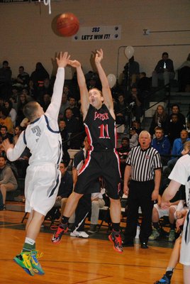 Pierson sophomore Sean Sloane fires up a three from the left corner