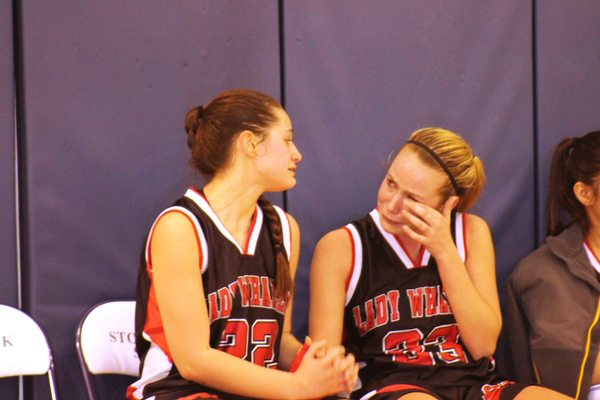 Pierson players Abby Ruiz and Emily Hinz react as the final seconds tick off the clock in their team's loss to Stony Brook. KERRY MONACO