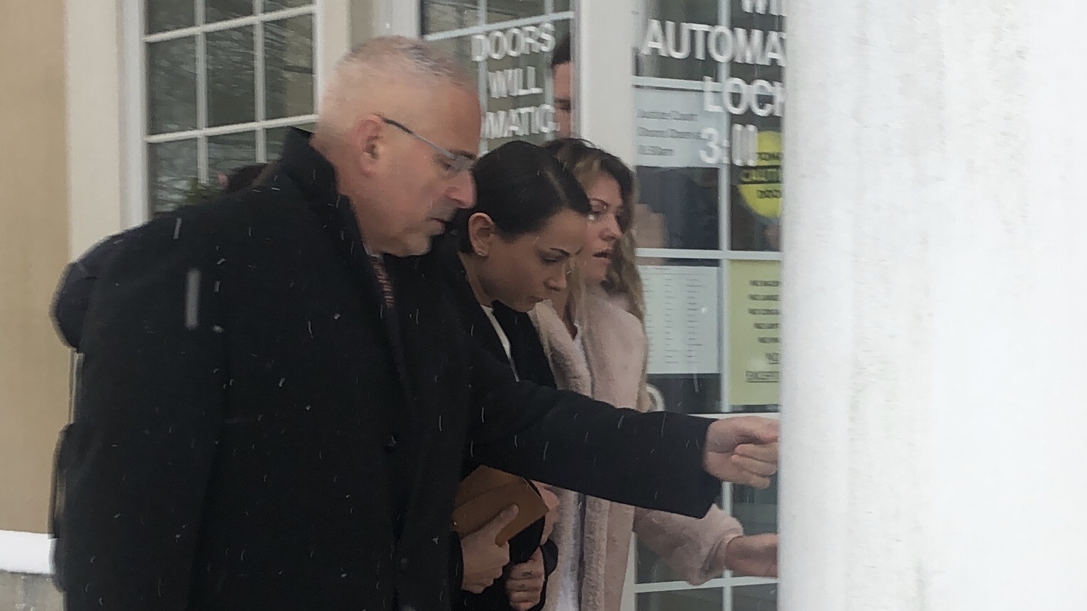 Lisa Rooney exits East Hampton Town Justice Court after being released without additional bail on Wednesday. 