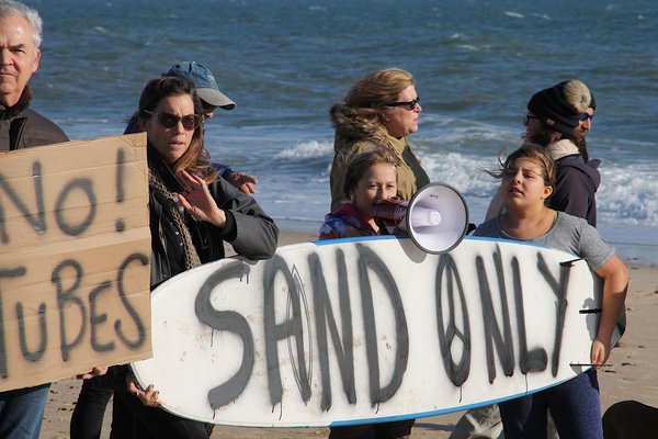 Protesters crowded the beach on Sunday to denounce the Army Corps shoreline project. KYRIL BROMLEY
