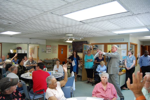 (Left to right) TJ Hatter and Bridget Fleming speaking at the East Hampton Senior Center. JON WINKLER