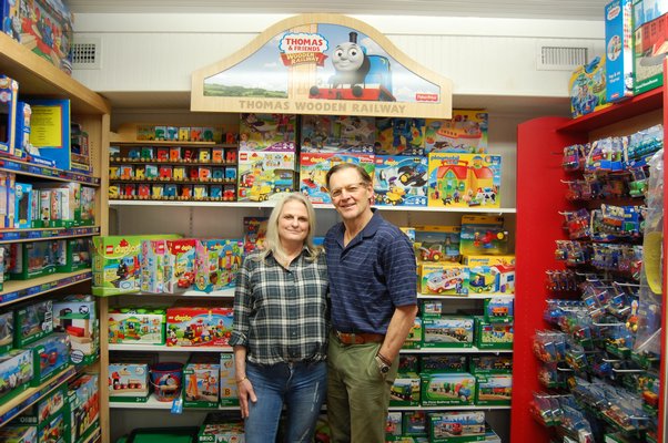 Stevenson's Toys store in Southampton with Roy and Polly Stevenson in the doorway. JON WINKLER