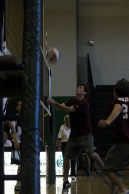 East Hampton's Brady Yusko gets under a ball into the net. KERRY MONACO