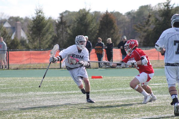 Shark Justin Pugal plays defense against Mount Sinai. Pugal scored his team's only two goals in the loss. KERRY MONACO