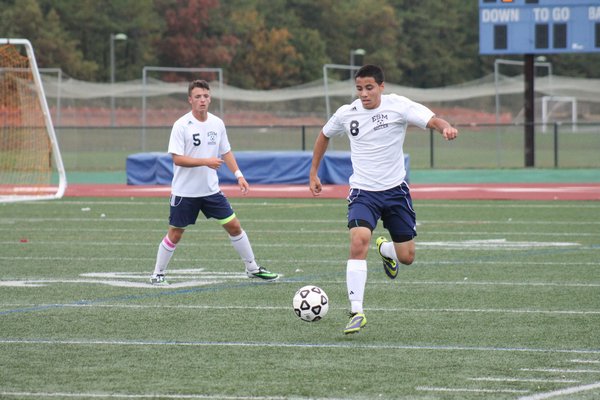 Frank Loria with the ball for ESM. KERRY MONACO